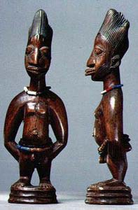 Figure 1The Yoruba have a high incidence of twins. However, the rate of child mortality is quite high, leading to the development of the ibeji or twin cult. If a twin dies, a figure is carved for the dead child, then clothed and fed alongside its live twin. If both children die, two figures such as these are created.
