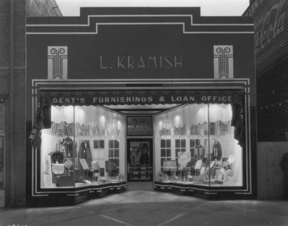 Louis Kramish's Storefront, Spruce Street, 1935. (Photo courtesy the Wyoming State Archives; Miller-Meyer Collection, P68-2/236) Like Louis, Max opened a clothing store on Front Street, Rawlins, specializing in "gents' furnishings." Initially, the store was only moderately successful. In time weak sales combined with an occasional robbery and petty vandalism (Rawlins Republican; Oct. 20, Nov. 3, 1921) forced Max to file for bankruptcy. He sold his business's stock for $600.00 and, in 1923, reopened in the Osborne Building on Cedar Street. There, he maintained a very successful and popular business (despite additional break-ins; Rawlins Republican, August 25, 1925; Dec. 1, 1925) for 18 years (Kinnaman, Personal files).