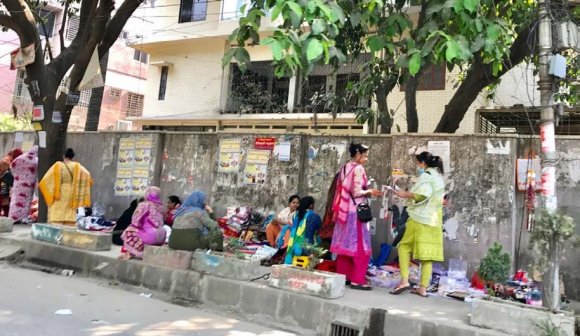 Figure 5: Women walking in groups with conservative attire during morning hours